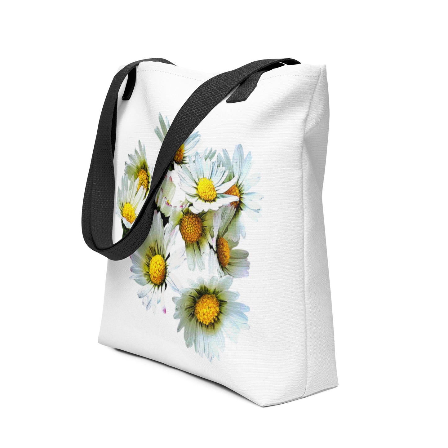 White daisy print shopping bag with black handles featuring bright yellow and white floral design