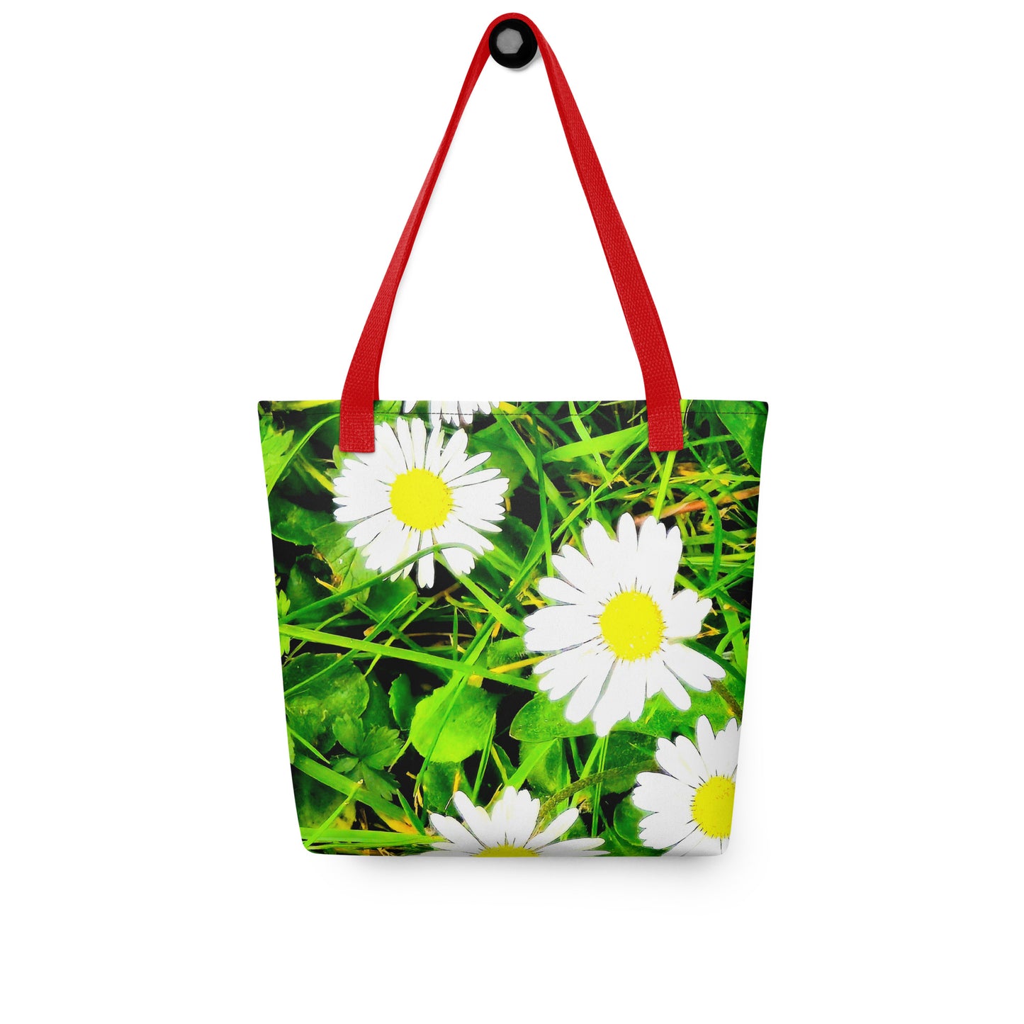 Daisy print tote bag with bright white and yellow daisies on green grass and red handles
