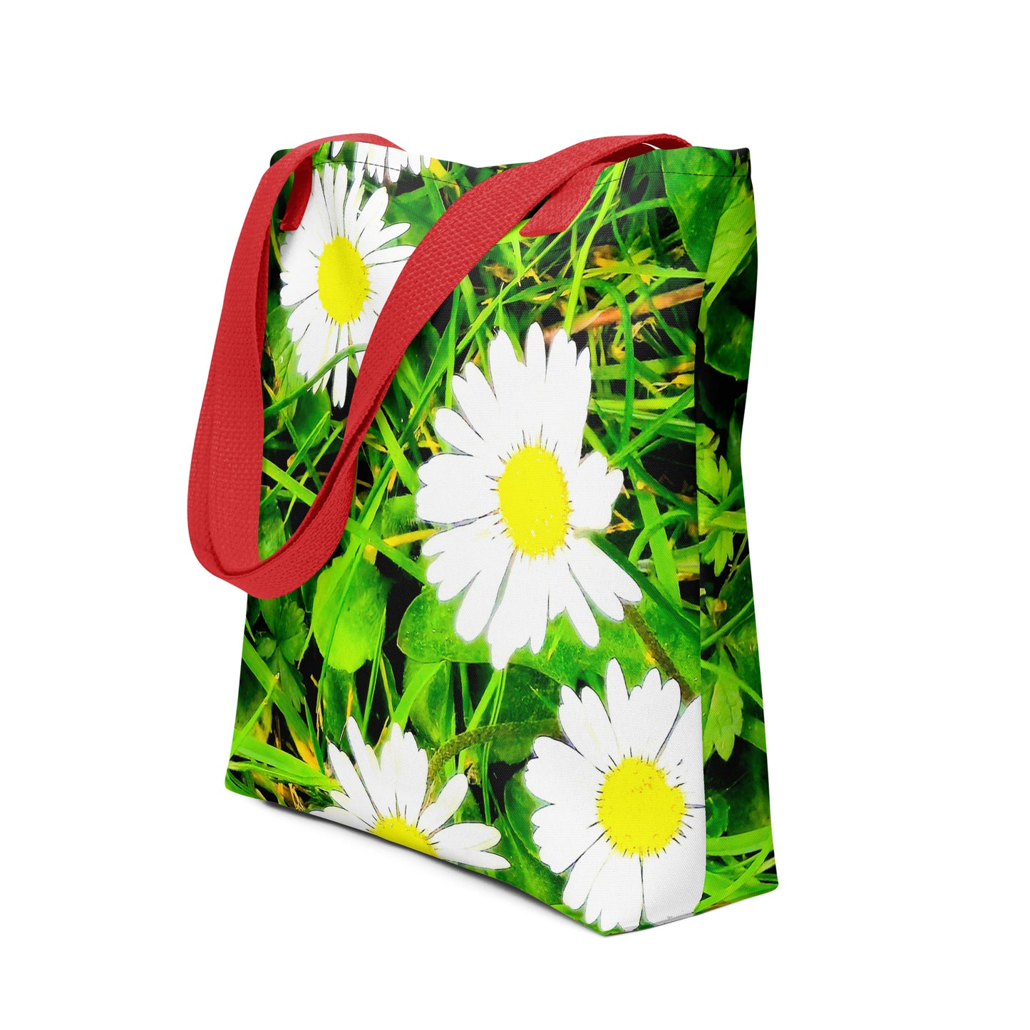 Daisy print tote bag with vibrant white and yellow daisies on green background and red handles