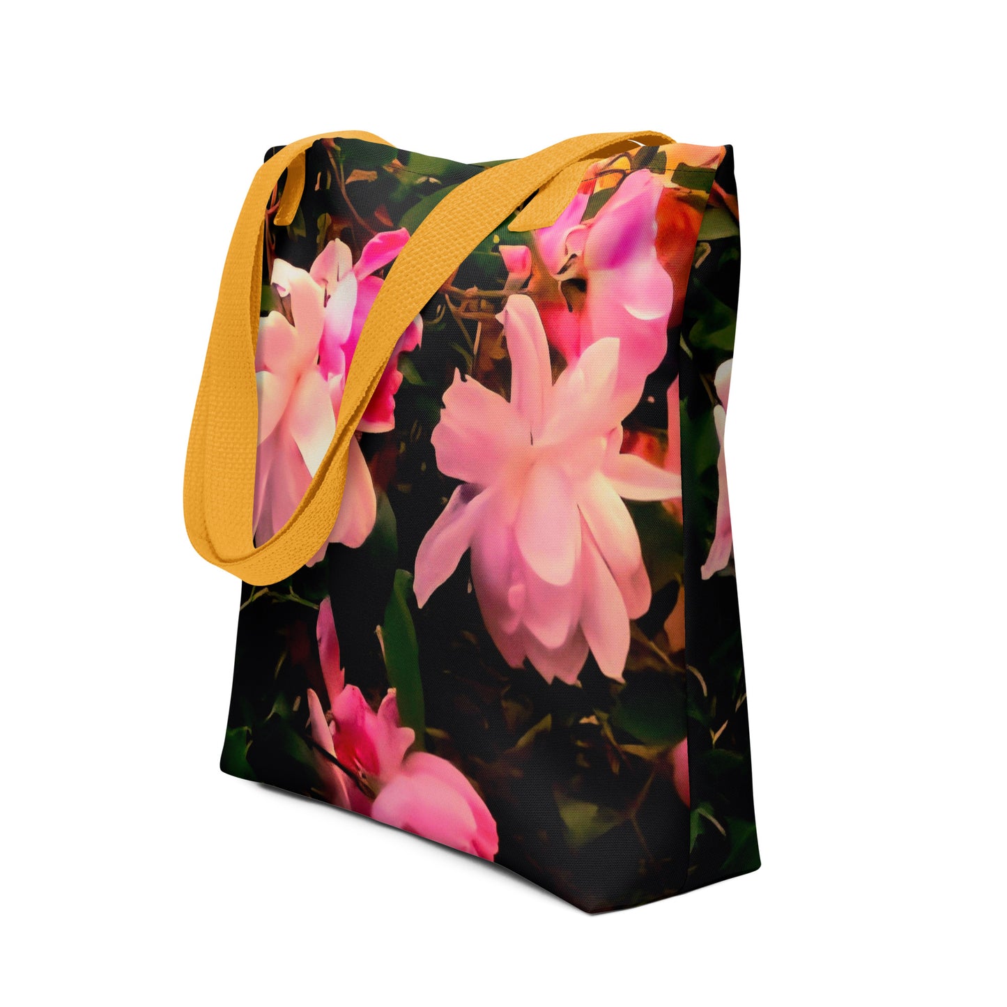 Pink flower tote bag for women with vibrant floral design and yellow handles from NUSH'S STORE