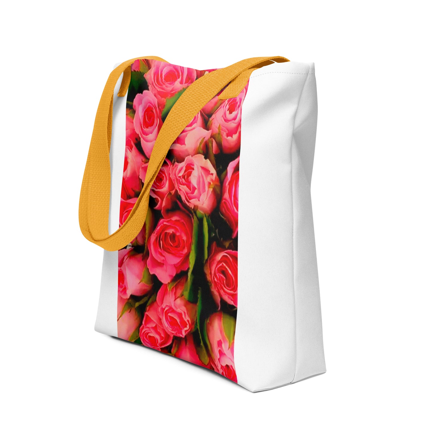 White tote bag with yellow straps featuring a vibrant pink rose print bag design
