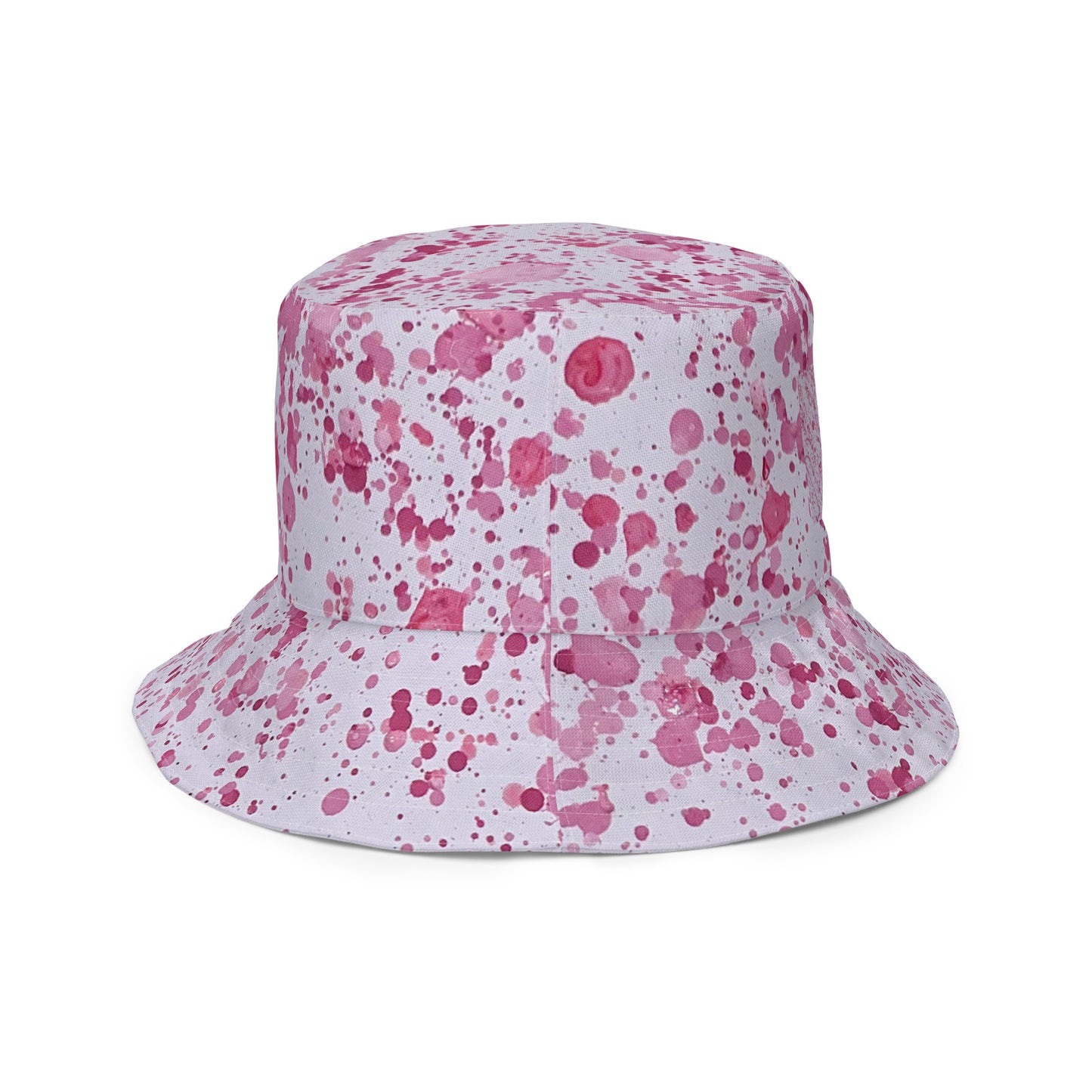 Pink splatter bucket hat from NUSH'S STORE with vibrant festival hat design