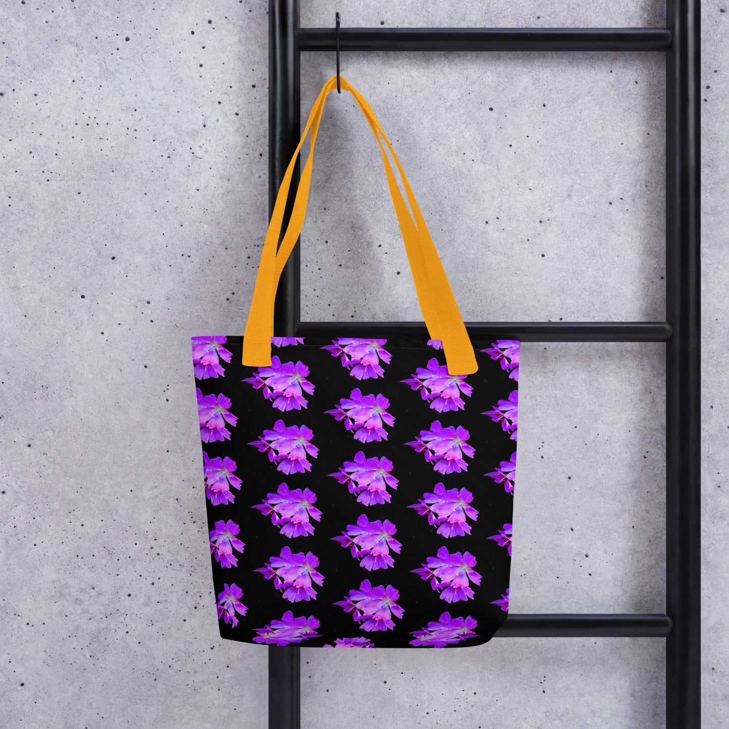 Purple flower print tote with vibrant purple flowers on black background and yellow handles