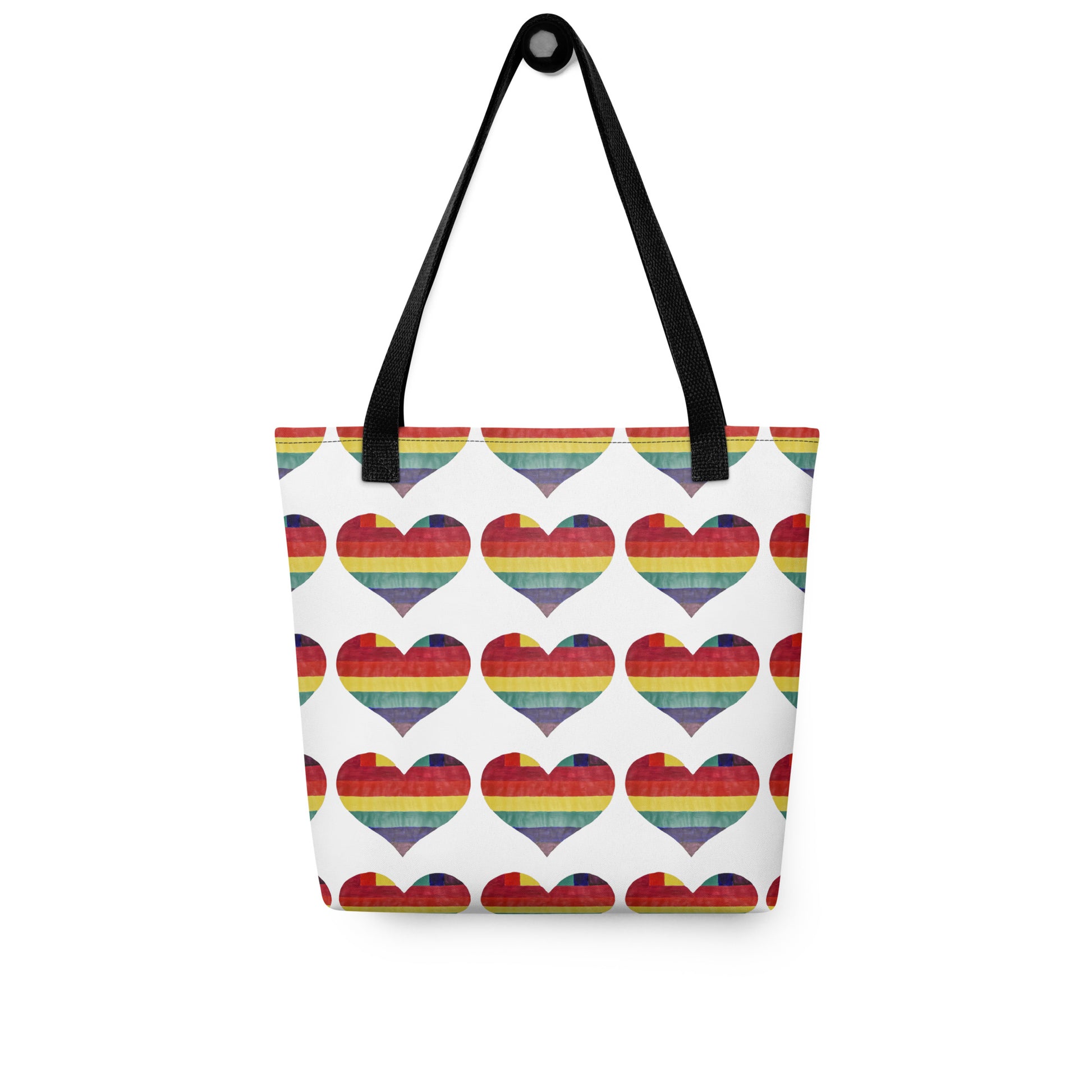 LGBT pride tote bag with rainbow heart pattern and black handles from NUSH'S STORE