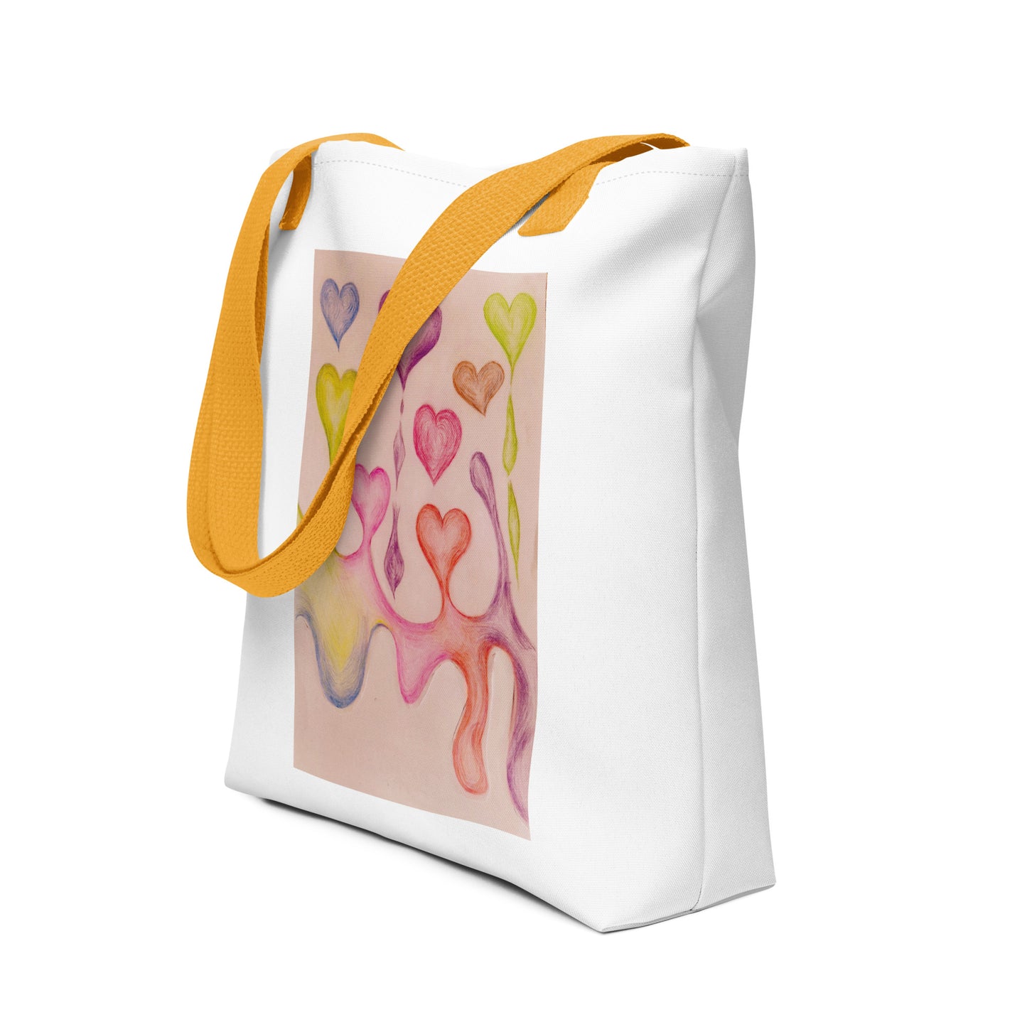 White tote bag with yellow straps featuring an artistic heart print tote bag design in pastel colors
