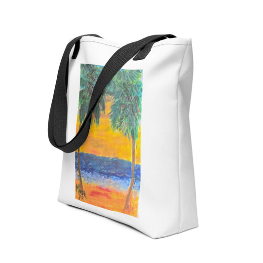 White beach tote bag with palm tree design and black handles featuring a colorful sunset scene