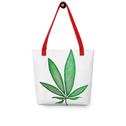 Canvas shopping tote with leaf design featuring green leaf print and red handles