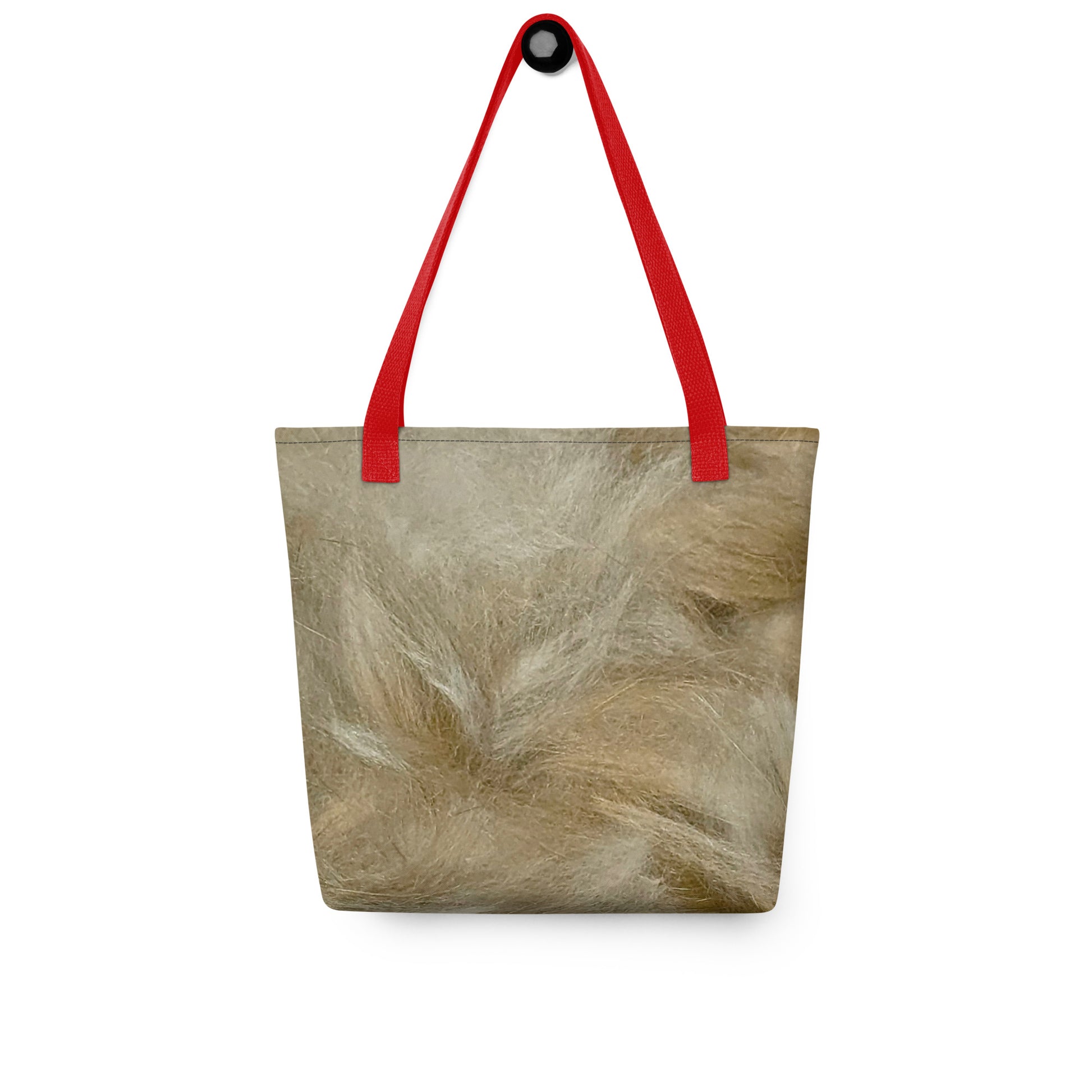 Durable canvas shopping tote with beige fur pattern and red shoulder straps hanging on hook