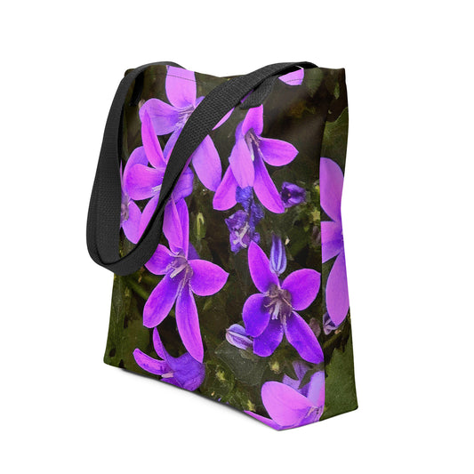 Eco-friendly floral bag with vibrant purple flowers and black strap from NUSH'S STORE