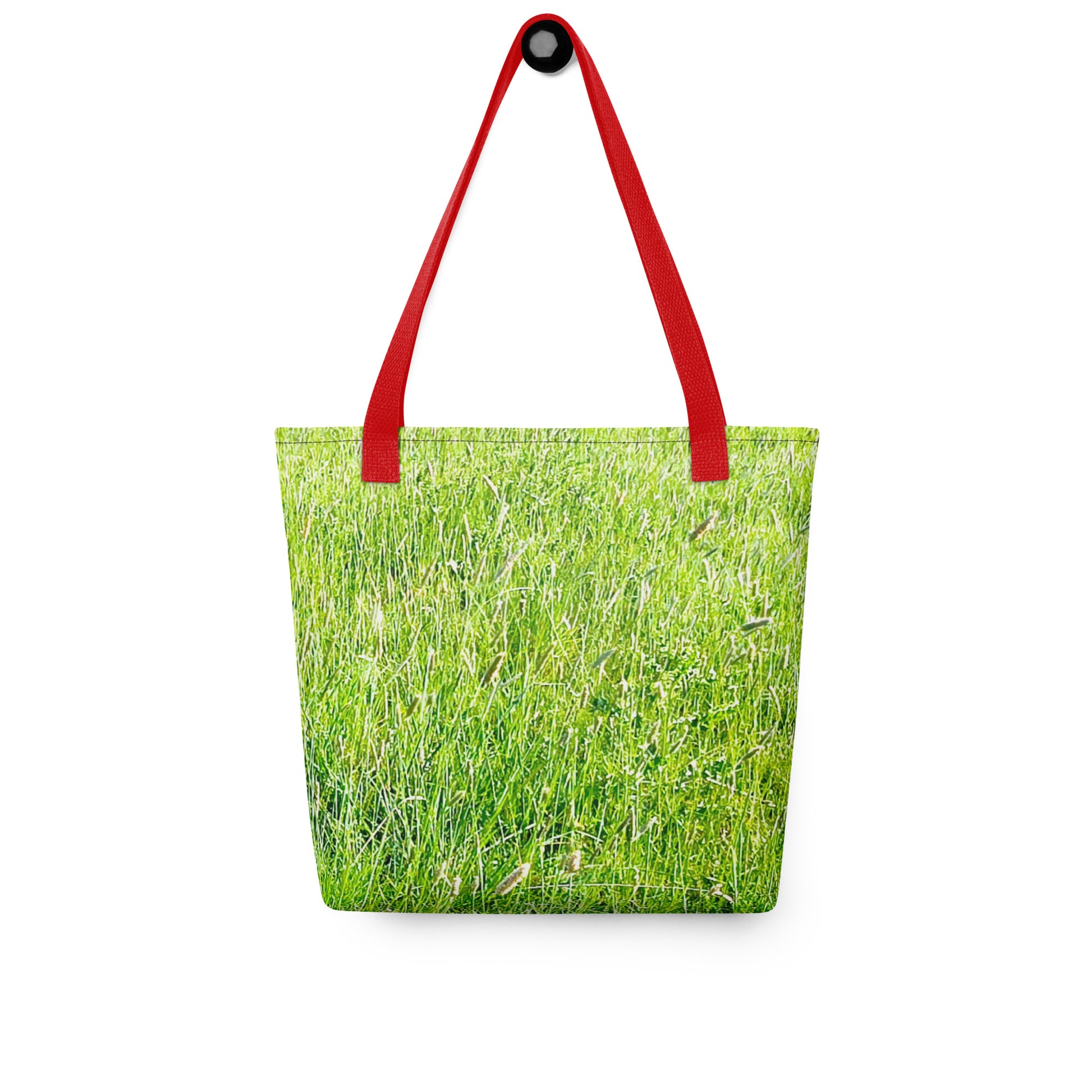 Grass print tote bag with vibrant green grass design and red shoulder straps from NUSH'S STORE
