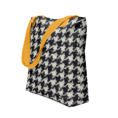 Black and white houndstooth tote bag with bright orange handles from NUSH'S STORE