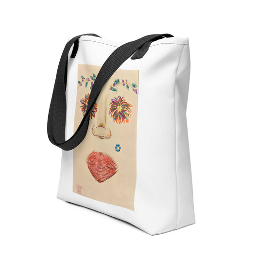 White large canvas tote with face print featuring colorful floral eyes and lips with black shoulder straps