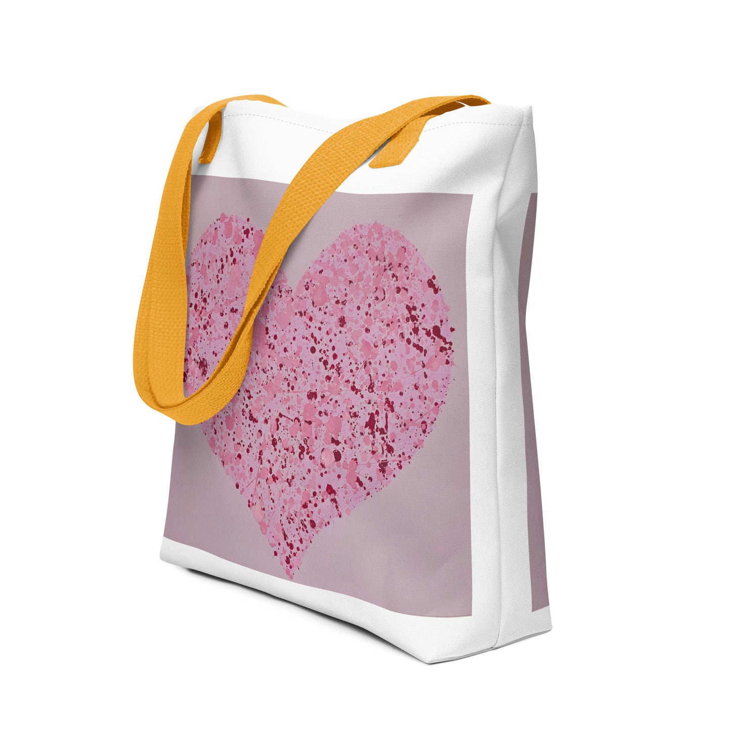 Large canvas tote with heart print in pink and purple with yellow shoulder straps