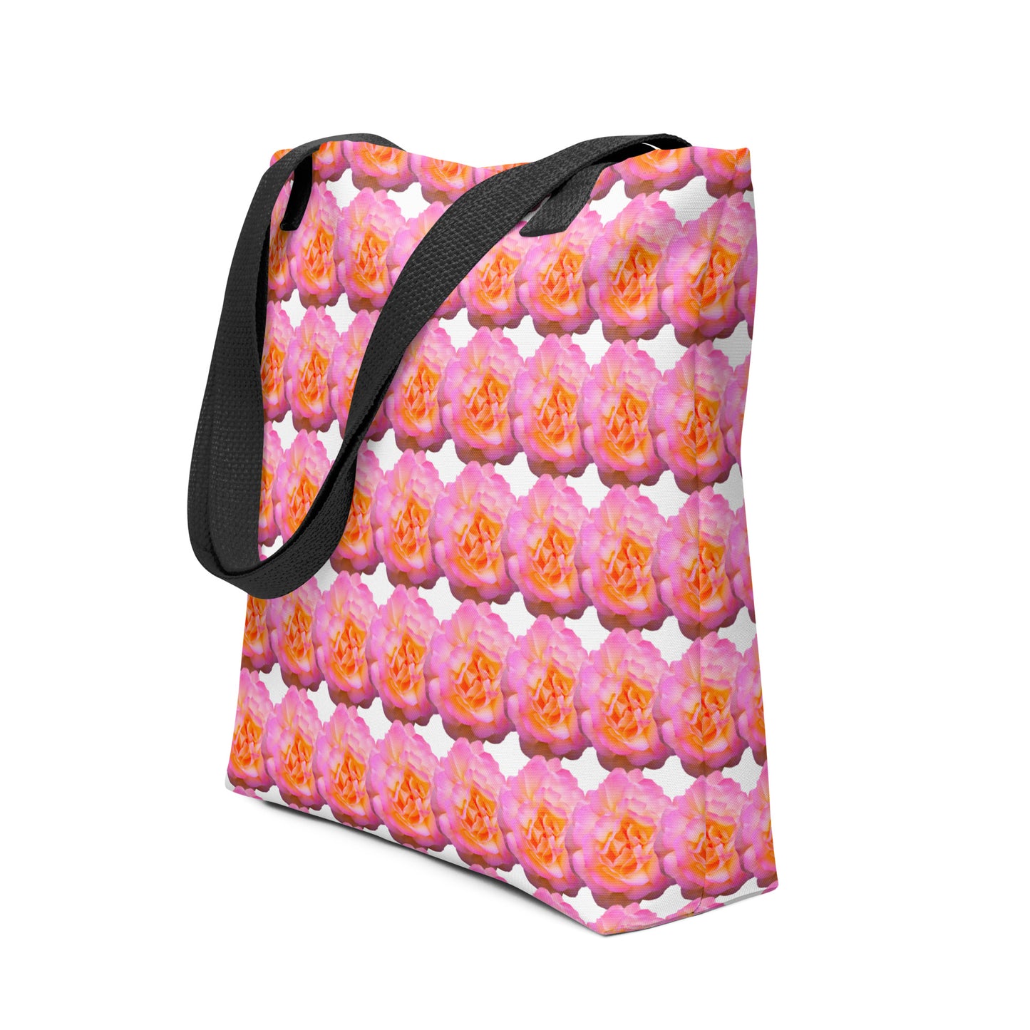 Pink flower print tote with vibrant floral design and black shoulder straps from NUSH'S STORE