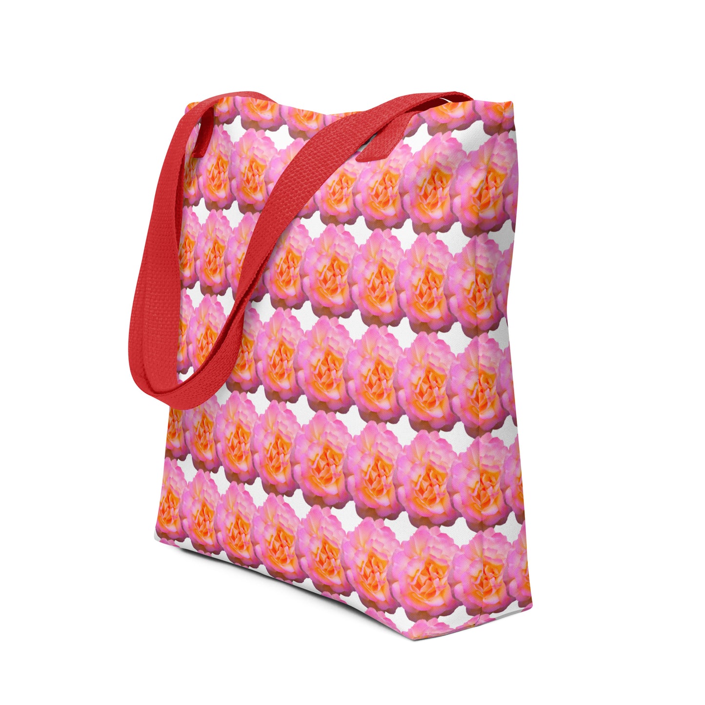Pink flower print tote with vibrant orange and pink roses and red shoulder straps from NUSH'S STORE