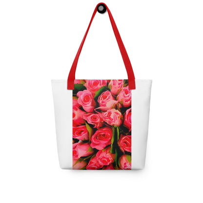 White tote with pink rose print bag design and red shoulder straps for stylish carrying