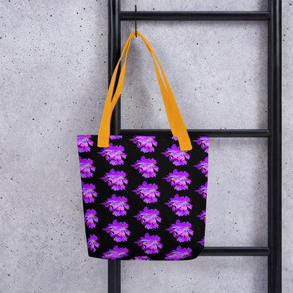 Purple flower print tote with vibrant purple flowers on black background and yellow handles