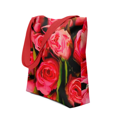 Rose print shopping bag with vibrant red and pink roses and red handles from NUSH'S STORE