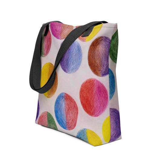 Unique art print tote bag featuring colorful hand-drawn circle designs with black handles