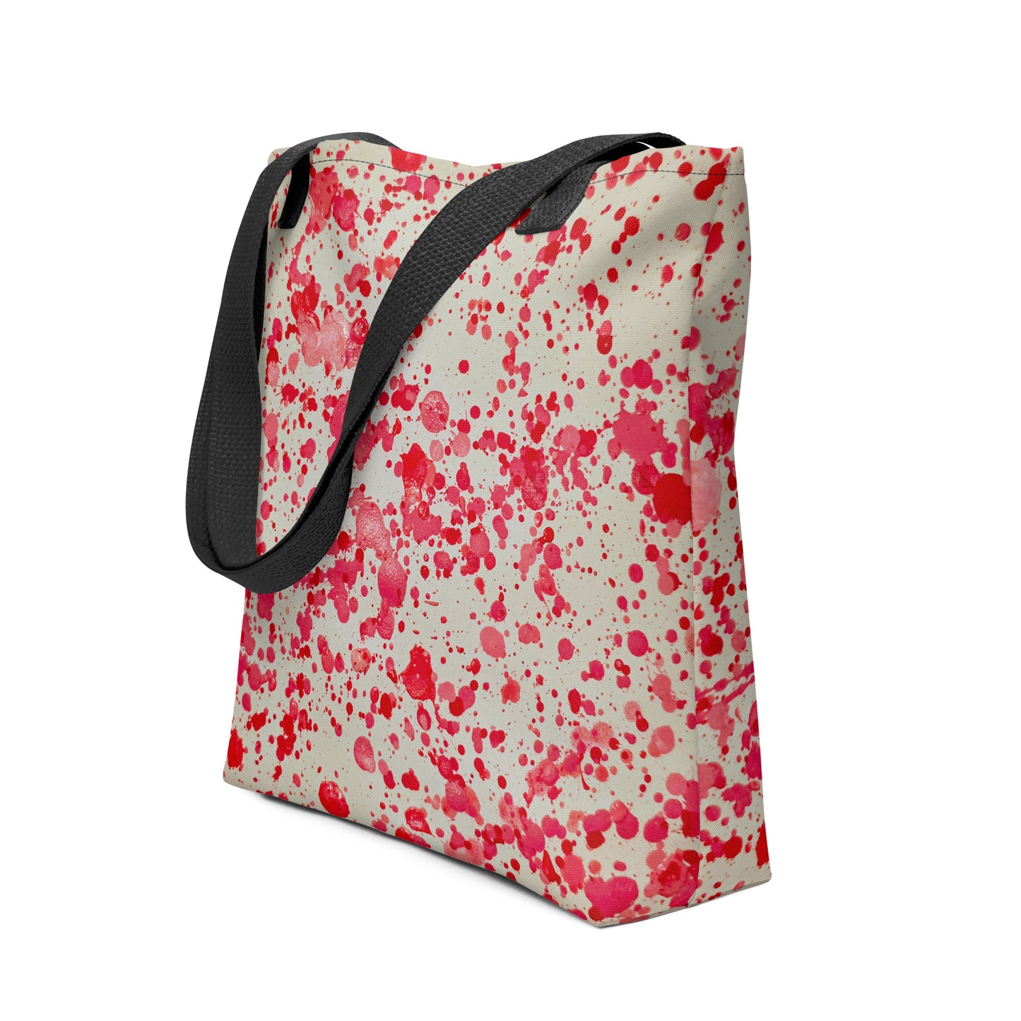 Unique designer tote bag women with red paint splatter pattern and black handles from NUSH'S STORE